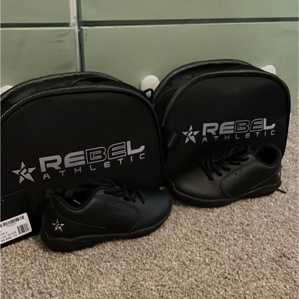 Rebel Athletics cheer shoes. Size Y2 and Y3, brand new still in the bags!